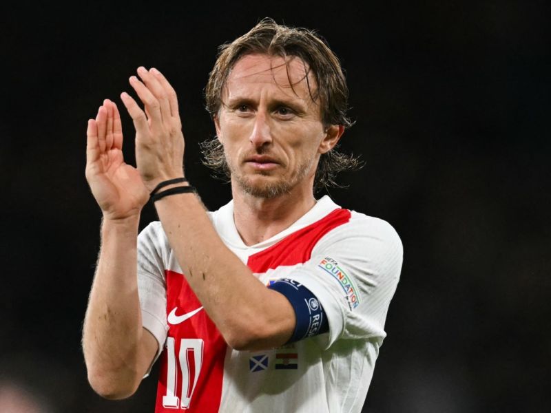 Croatia's midfielder #10 Luka Modric applauds at the end of the UEFA Nations League, League A, Group 1 football match between Scotland and Croatia at Hampden Park Stadium, in Glasgow, on November 15, 2024. Scotland wins 1 - 0 against Croatia. (Photo by ANDY BUCHANAN / AFP)