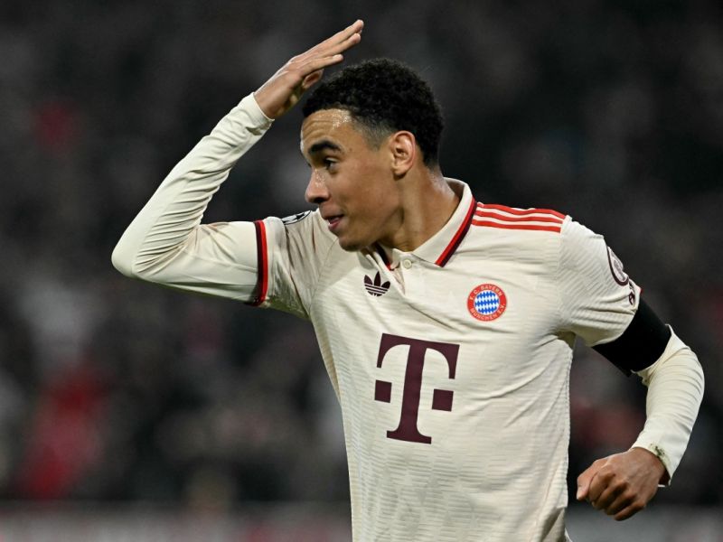Bayern Munich's German midfielder #42 Jamal Musiala celebrates after scoring the 1-0 opening goal during the UEFA Champions League football match FC Bayern Munich vs SL Benfica in Munich, southern Germany, on November 6, 2024. (Photo by Tobias SCHWARZ / AFP)