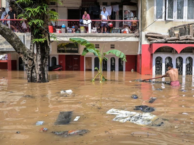 150 dead as unseasonal rains trigger floods and landslides in India and Nepal