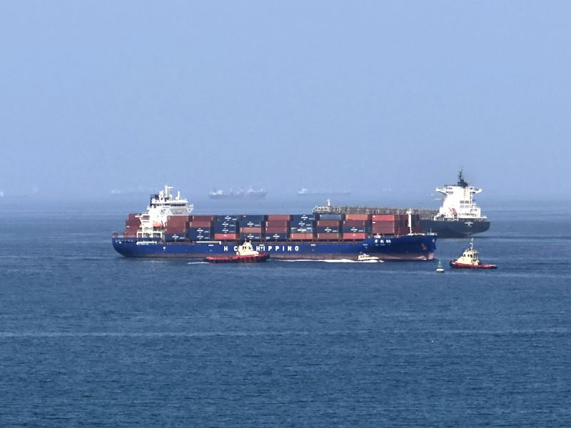 Foreign cargo ship runs aground in Strait of Hormuz as Iran defends shipping controls