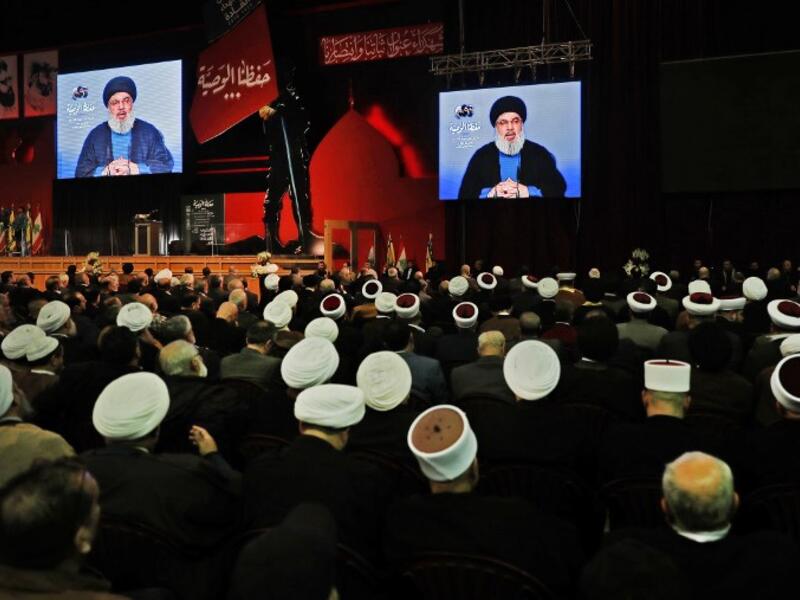 Lebanese Hezbollah Leader Hassan Nasrallah delivers a televised speech during a ceremony held by the Shiite party in the capital Beirut, commemorating the party's killed leaders, on Feb.16, 2018. 
(JOSEPH EID / AFP)