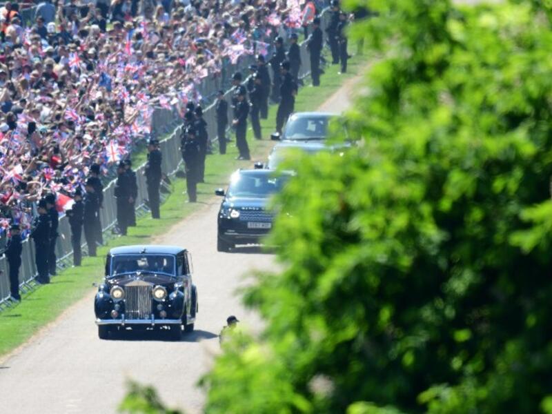 Meghan Markle and her mother, Doria Ragland, are driven along the Long Walk as they arrive for her wedding ceremony to marry Britain's Prince Harry, Duke of Sussex, at St George's Chapel, Windsor Castle, in Windsor, on May 19, 2018. 
Emmanuel DUNAND/ AFP
