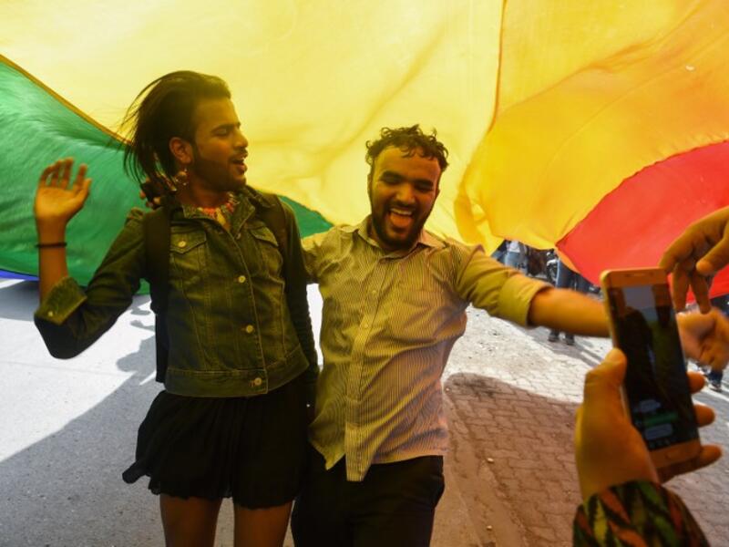 Indian members and supporters of the lesbian, gay, bisexual, transgender (LGBT) community celebrate the Supreme Court decision to strike down a colonial-era ban on gay sex, in Mumbai on September 6, 2018.
INDRANIL MUKHERJEE / AFP