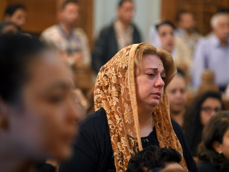 A Coptic Christian woman mourns victims killed in an attack a day earlier, during an early morning ceremony at the Prince Tadros church in Egypt's southern Minya province, on November 3, 2018. 
MOHAMED EL-SHAHED / AFP