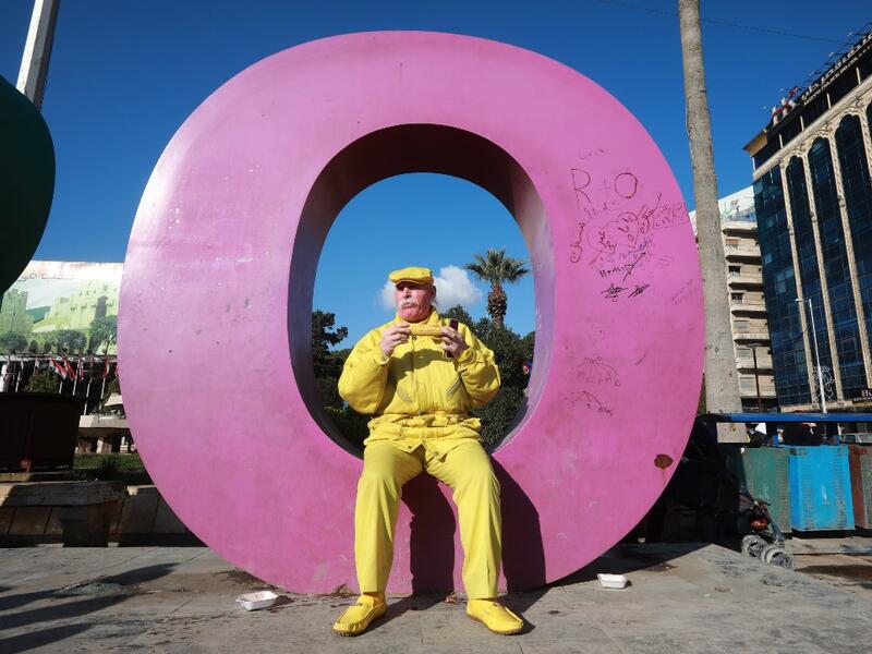 For nearly 36 years, the 70-year-old has strictly abided by a full monochrome look, sporting only yellow apparel and accessories. 

LOUAI BESHARA / AFP