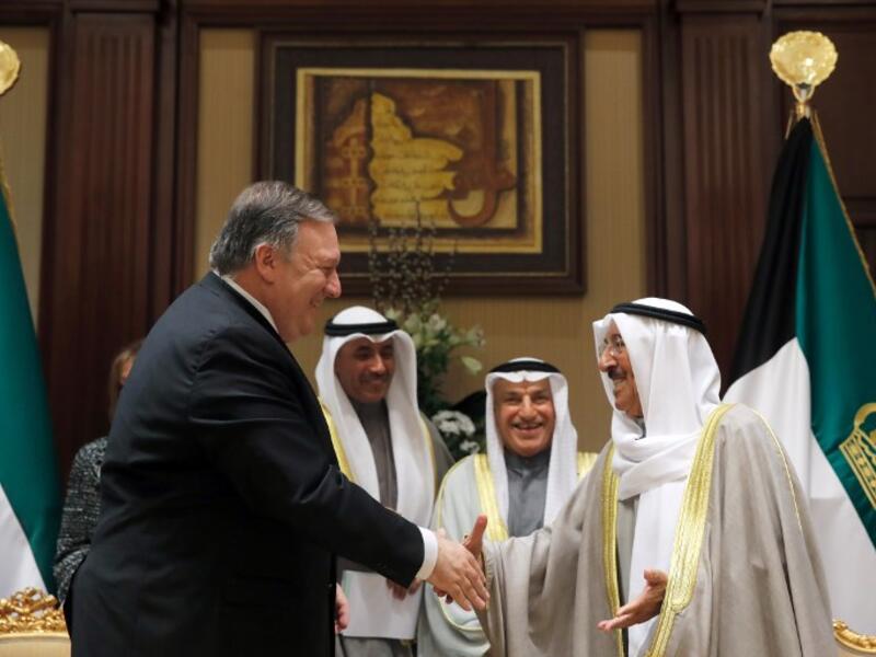 US Secretary of State Mike Pompeo (L) is welcomed by Kuwait's Emir Sheikh Sabah al-Ahmad al- Jaber al-Sabah (R) in Kuwait City on March 20, 2019.
JIM YOUNG / POOL / AFP