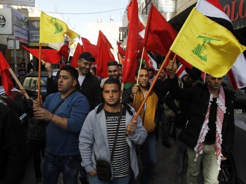 Supporters of the Popular Front for the Liberation of Palestine (PFLP) take part in a demonstration in Bethlehem in the Israeli occupied West Bank, as protests continue in the region amid anger over the U.S. president's recognition of Jerusalem as Israel's capital. 
Musa AL SHAER / AFP