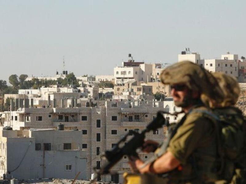 Israeli soldier looks on  (AFP/File Photo)
