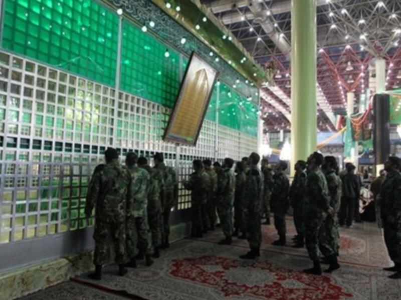 Iranian soldiers visit the shrine of Ayatollah Ruhollah Khomeini.