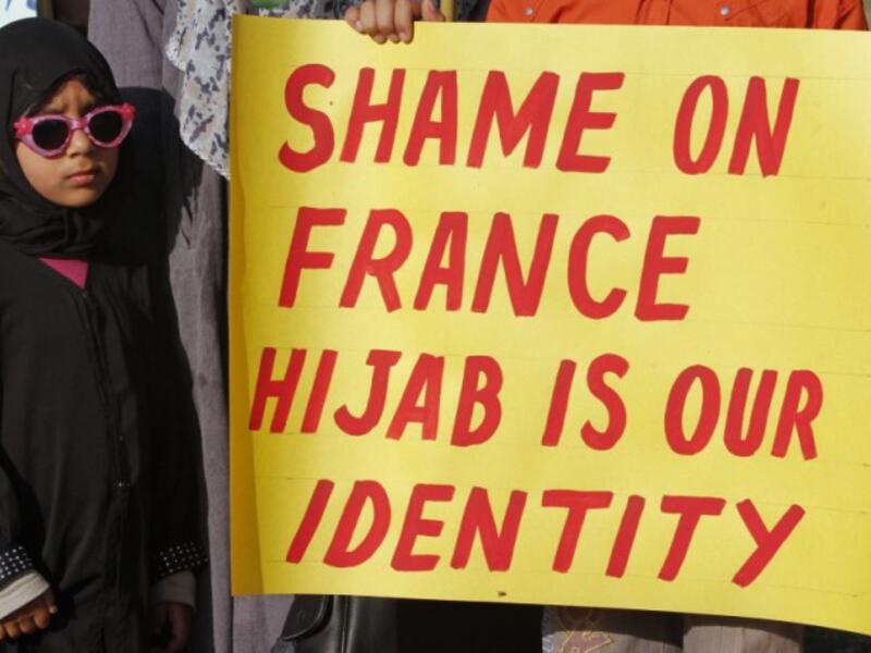 Shame-on-france-hijab-is-our-identity-french-authorities-ban-women-sign-protest-www.barenakedislam.com-2015