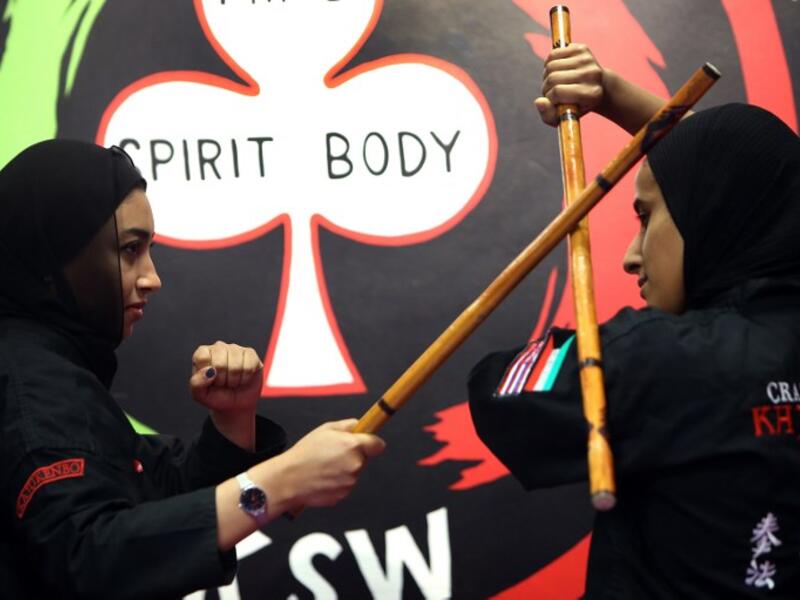 Kuwaiti women practise hybrid martial art Kajukenbo in a club in Kuwait City.
Yasser Al-Zayyat / AFP