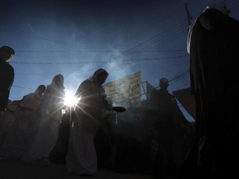 Iraqi Yazidis attend the funeral of the Mir Takhsin-Beg (Tahseen Said Ali), the hereditary leader of the Yazidi community in the world, in the town of Sheikhan, 50km northeast of Mosul.
SAFIN HAMED / AFP