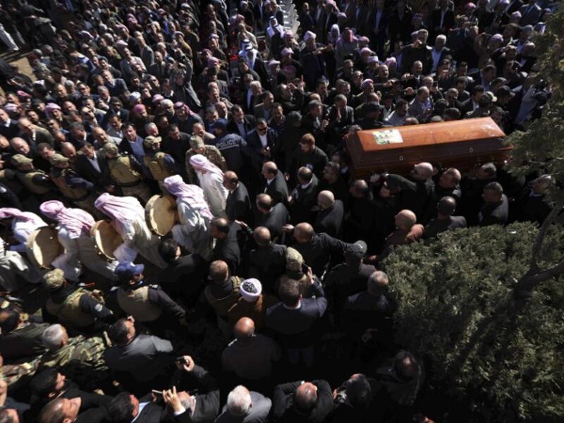 Iraqi Yazidis carry the coffin of the Mir Takhsin-Beg (Tahseen Said Ali), the hereditary leader of the Yazidi community in the world, during his funeral in the town of Sheikhan.
SAFIN HAMED / AFP