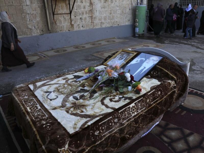 A picture taken on February 5, 2019, shows a photo of the Mir Takhsin-Beg (Tahseen Said Ali), the hereditary leader of the Yazidi community in the world, on the his bed during his funeral in the town of Sheikhan.
SAFIN HAMED / AFP