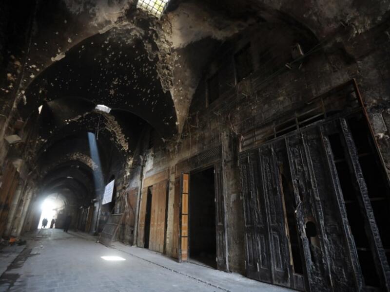 A general view shows the damaged inflicted on the Old Aleppo markets in the old quarter of Syria's second city of Aleppo 
LOUAI BESHARA / AFP
