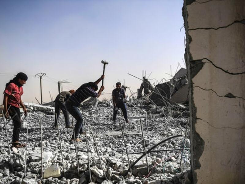 Resettling people who are looking for someone to blame back in Raqqa and Mosul threatens to violently renew social divisions. More must be done to reconcile Iraq and Syria's social divisions (AFP/FILE)