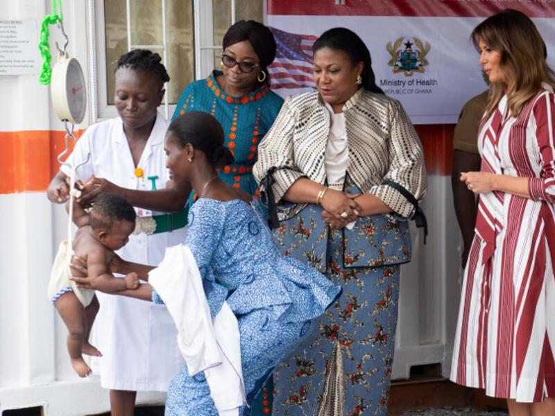 US First Lady Melania Trump (R) and Rebecca Akufo-Addo (3rdR) watch as a baby is weighed during a visit to the Greater Accra Regional Hospital in Accra, on October 2, 2018. (SAUL LOEB / AFP)