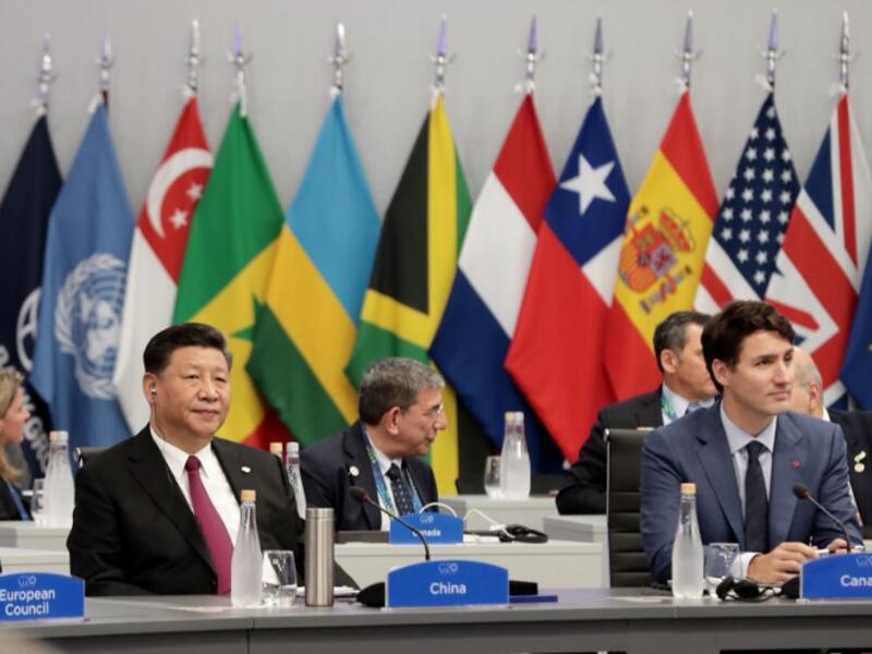 China's President Xi Jinping(R) and Canadian Prime Minister Justin Trudeau attend the G20 Leaders' Summit in Buenos Aires, on November 30, 2018. 
Alejandro PAGNI / AFP