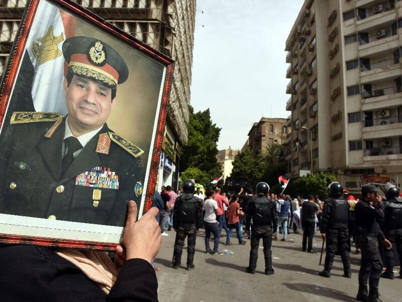 Egypt's President Abdel Fattah al-Sisi had initially promised modernity and vowed religion would not be used in politics again, but the authorities' actions say otherwise. (AFP/Mohamed El-Shahed )