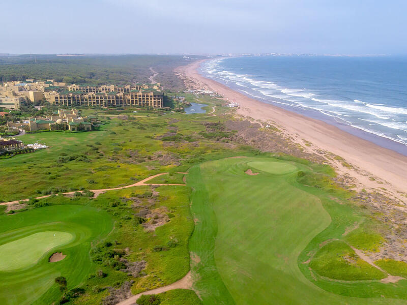 Set alongside a long stretch of the Atlantic Ocean, Mazagan Beach & Golf Resort is a par-72, 18 holes links golf course designed by the legendary Gary Player. Following the gentle curves and slopes of the dunes, the course was created with an aim to respect the environment by preserving the land’s natural features.