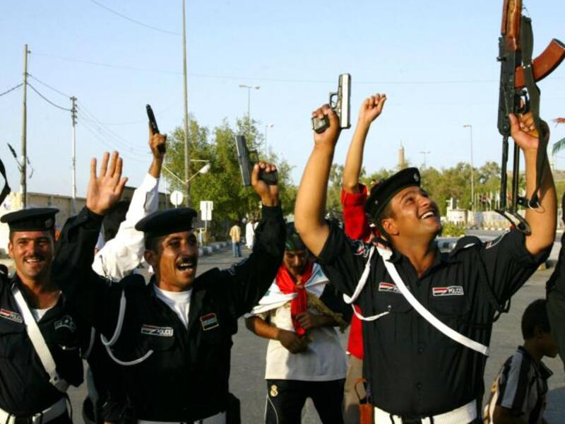 Celebratory gunfire is common in the Arab world, including in Iraq, pictured here (AFP/File)