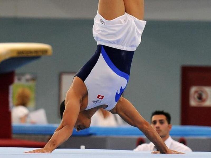 لاعب الجمباز التونسي وجدي بوعلاق: شارك في أولمبياد أثينا 2004 واختير رياضي العام 2006 في تونس، يعد اللاعب الوحيد الذي يمثل بلاده في رياضة الجمباز خلال أولمبياد لندن، كادت مسيرته أن تنتهي بعد إيقافه مدى الحياة خلال عصر الرئيس السابق زين العابدين بن علي.