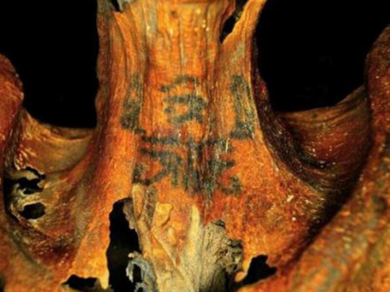 Woman with ancient tattoos (Twitter)