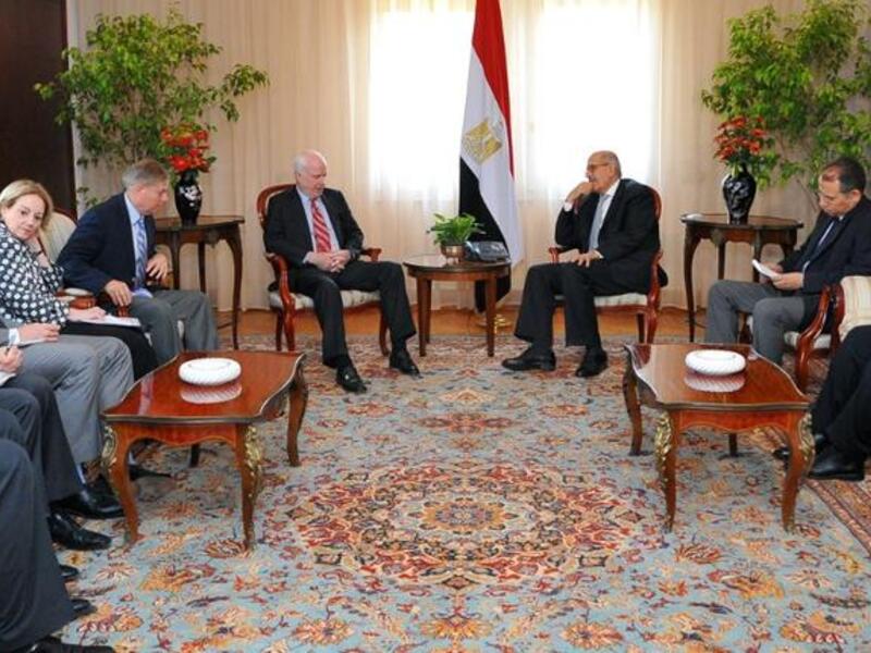 EGYPT, Cairo : A handout picture made available by the Egyptian presidency on August 6, 2013, shows Egypt's Vice President Mohamed ElBaradei holding talks with the US Senator John McCain on August 6, 2013 in Cairo. "AFP PHOTO / HO /EGYPTIAN PRESIDENCY " 