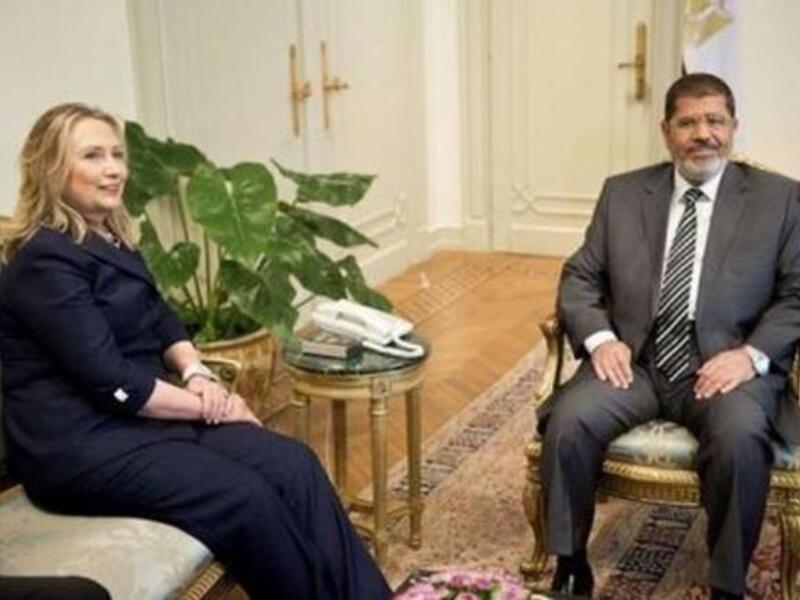 Morsi and Clinton