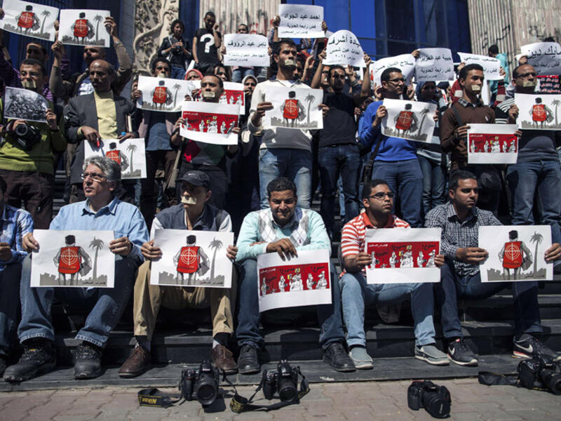 Thousands of activists, as well as several journalists, have been detained since former army chief and now President Abdel Fattah al-Sisi overthrew predecessor Mohamed Morsi in 2013. (AFP/Mohamed El-Shahed)