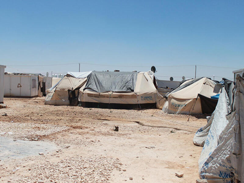 A simple reminder of where this creativity is happening.  Not in art museums, universities or art studios. But within a fenced compound atop hard-packed desert sand called Zaatari.