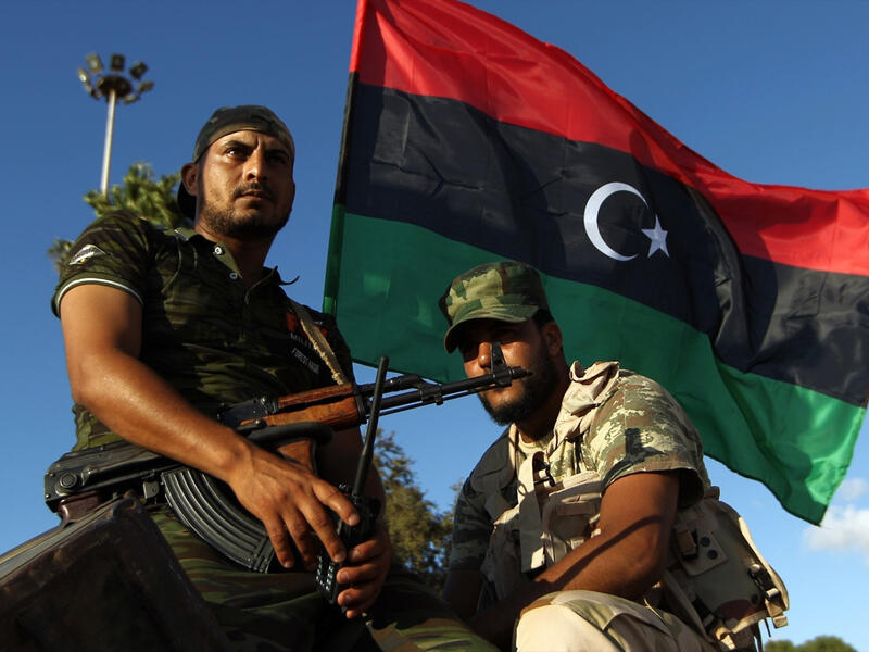 After Gaddafi’s death, Libya is ruled by a National Transitional Council, a political body made up of representatives from various tribes and rebel groups. Fighting between local militias continues throughout the country as warlords vie for power in the vacuum created by Gaddafi’s absence.
