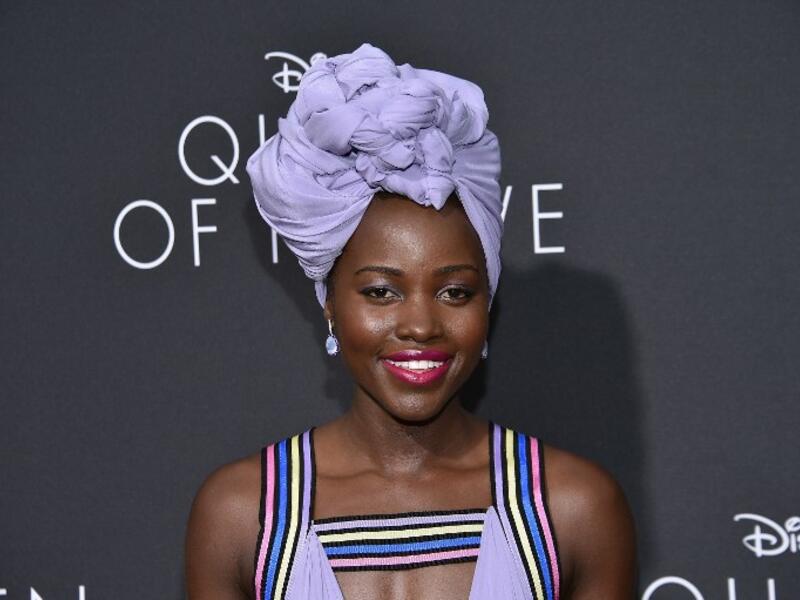 Queen of Katwe centers on Phiona (Nalwanga), a real-life Ugandan chess prodigy who was named a Woman Candidate Master after her performance at the World Chess Olympiads. (AFP/Mike Windle)