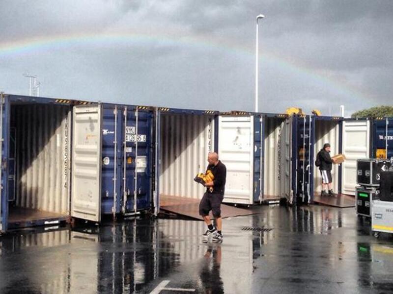 Underneath a gorgeous rainbow, the crew loaded 40 containers for the long haul to Dubai. (Image: Facebook)
