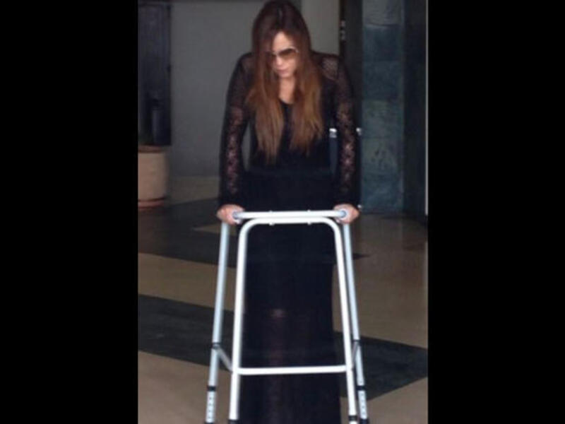 Carole Samaha is up and at 'em again with the support of a walker (Image: Twitter)
