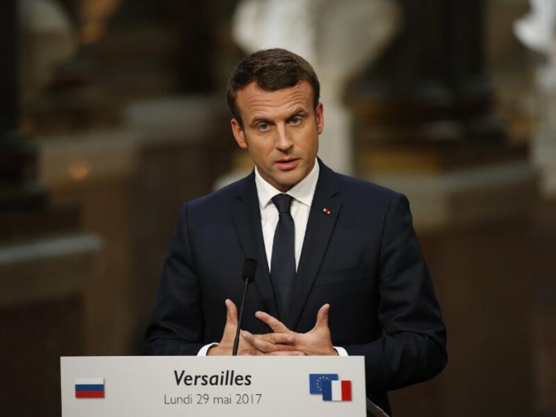 French President Emmanuel Macron delivers a joint press conference following his meeting with his Russian counterpart at the Versailles Palace, near Paris, on May 29, 2017. (AFP/Geoffery Van Der Hasselt)