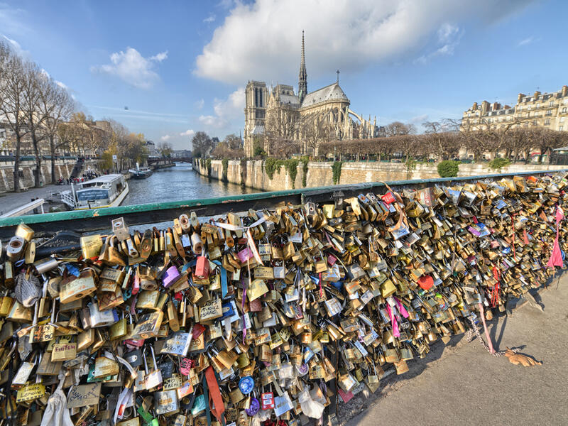 French authorities began removing the 'love locks' after a section of the bridge partially collapsed under the weight. (Shutterstock)