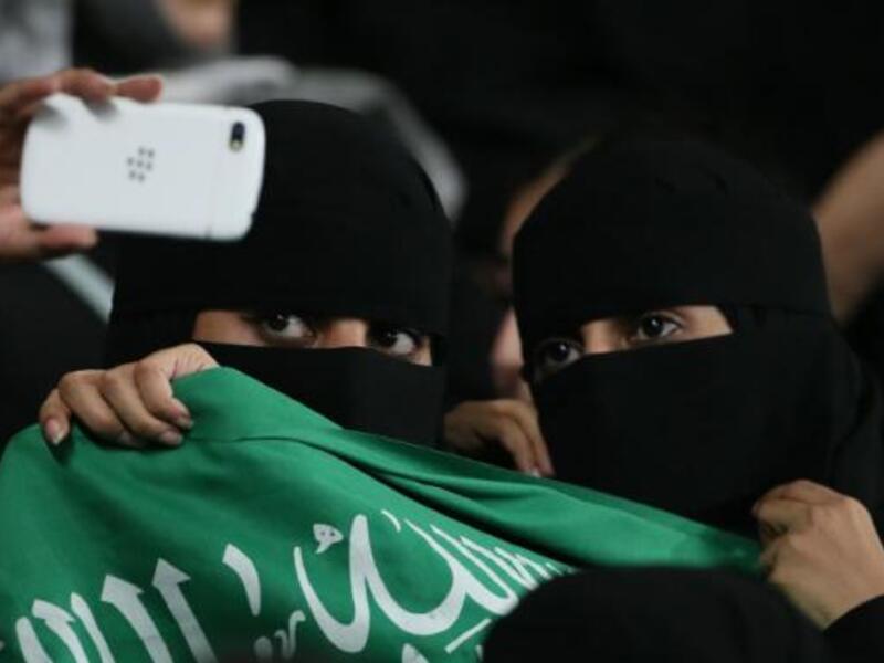 Saudi women take a selfie at a football game in September 2014.  (AFP/Karim Sahib)