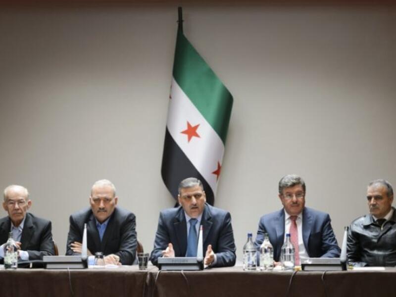 Members of the HNC meet in London (AFP/Fabrice Coffrini)