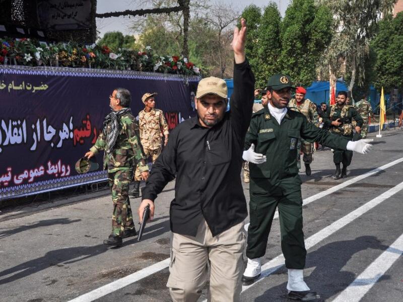 An attack on a military parade that was marking the anniversary of the outbreak of its devastating 1980-1988 war with Saddam Hussein's Iraq. (BEHRAD GHASEMI / ISNA / AFP)