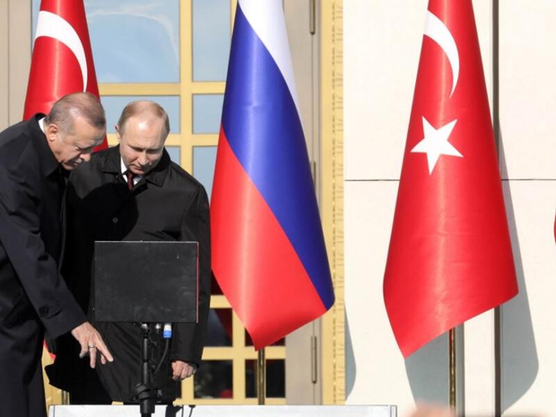Turkish President Erdogan (L) and Putin attend a ground-breaking ceremony of Turkey's first nuclear power station at the Presidential Palace in Ankara on April 3, 2018.  Putin arrived for a Turkey visit also to coordinate policy on Syria. (AFP File Photo)