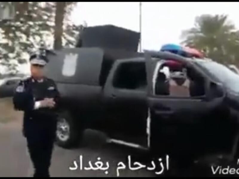 'Baghdad traffic', an Iraqi traffic officer confronts ministerial security over its road block (screenshot)