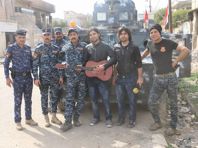 Recognizable for their mops of hair, the pair accompanied Iraqi security forces throughout much of the campaign for Mosul (Facebook)