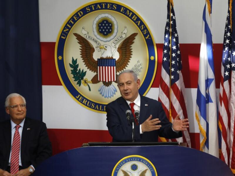 US ambassador to Israel David Friedman listens as Israel's Prime Minister Benjamin Netanyahu delivers a speech during the opening of the US embassy in Jerusalem on May 14, 2018. MENAHEM KAHANA / AFP