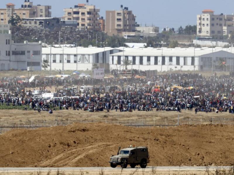 Tens of thousands protested and clashes erupted along the Gaza border against the US transfer of its embassy to Jerusalem, after months of global outcry, Palestinian anger and exuberant praise from Israelis over President Donald Trump's decision tossing aside decades of precedent. JACK GUEZ / AFP

