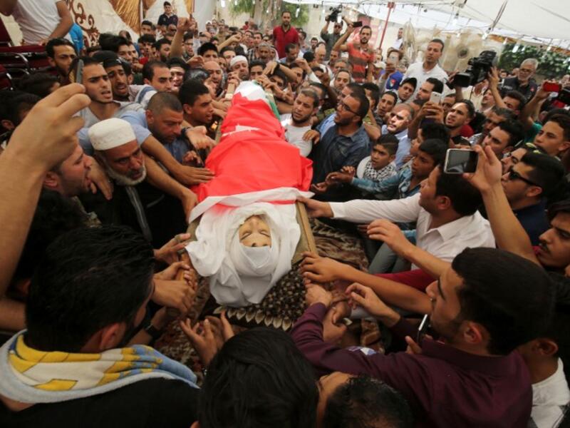 Thousands of Jordanians called for "death to Israel" as they attended the funeral of Jawawdeh who was shot dead by an Israeli embassy security guard. (Khalil Mazraawi/AFP)