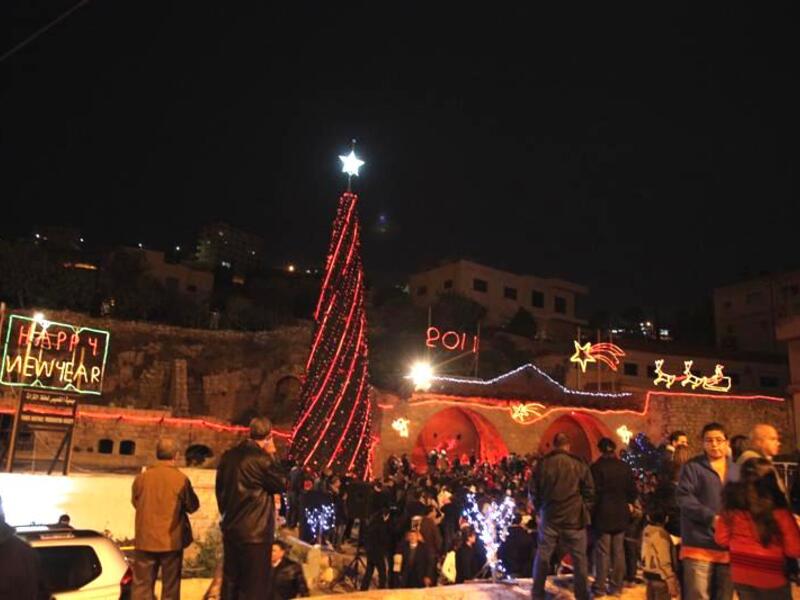 Fuheis is usually at the heart of Jordanian Christmas celebrations, but this year its planned seasonal events have been abandoned following Sunday’s deadly shootings in Karak. Elsewhere in the Kingdom, Madaba and al-Hussen's Christmas trees, planned to be lit up later this week, will instead remain darkened in mourning for the ten Karak victims.