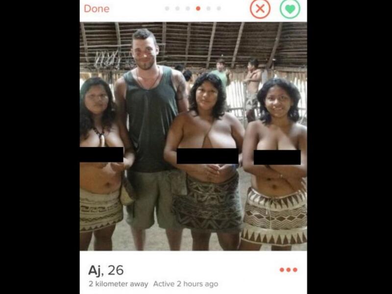 white man with bare-breasted indian women