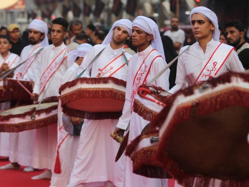 Shiite pilgrims take part in the preparations of the Ashura ceremony in Karbala, about 80 kilometres (50 miles) southwest of Baghdad on September 18, 2018. AHMAD AL-RUBAYE / AFP