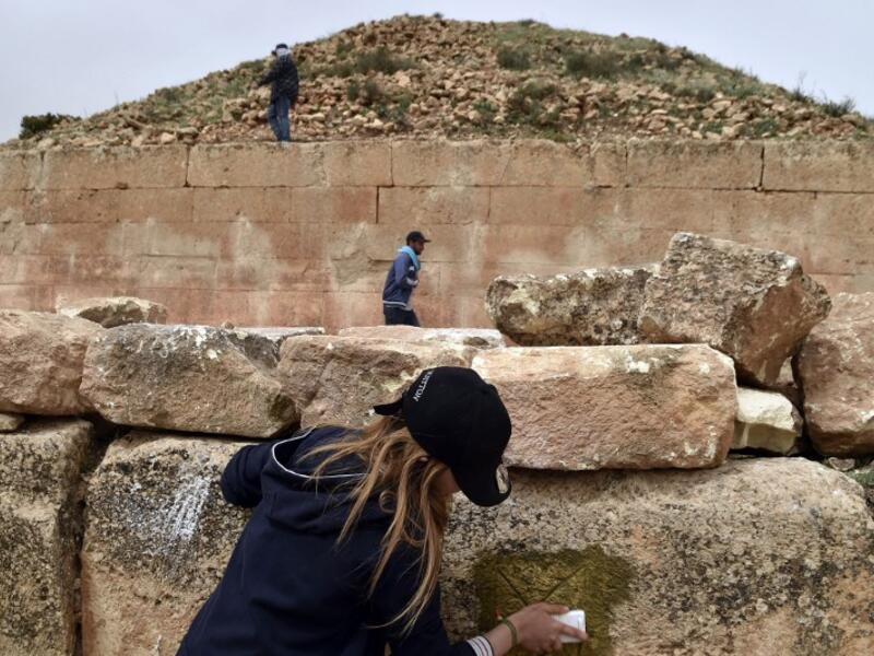 Experts and students from Algiers University’s Archaeology Institute work on one of the Jeddars pyramid tombs, near the city of Tiaret.
RYAD KRAMDI / AFP